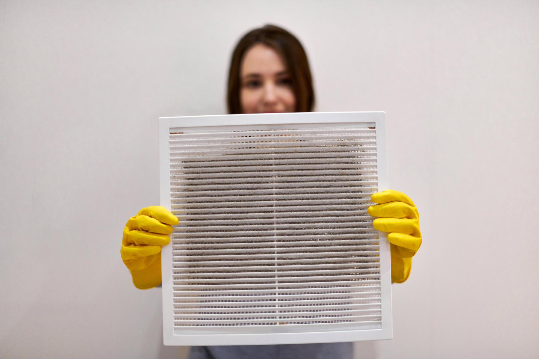 Lady Holding Dirty Vent for Prescription Duct Cleaning Lady Holding Dirty Vent for Prescription Duct Cleaning